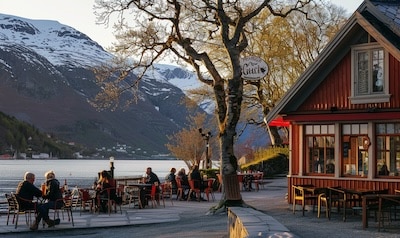 2 Norwegische Kultur utepils Fruehlingsbier am Fjord